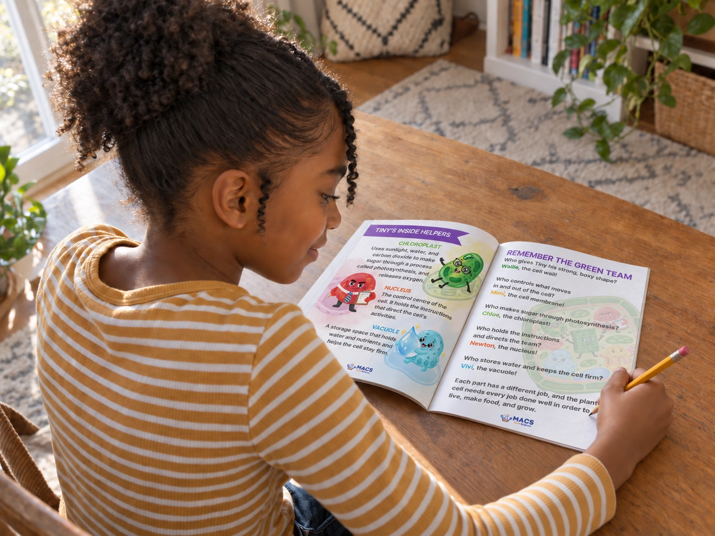 A child writes in a plant-cell workbook at a table at home.